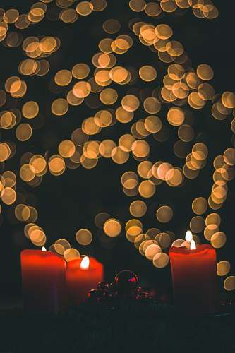 candle three lighted pillar candles fire