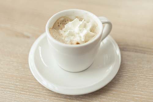 saucer espresso con panna in white cup whipped cream
