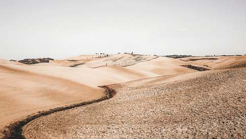 soil pathway leading to city dune