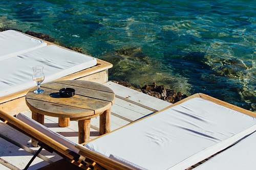 croatia round brown wooden coffee table water