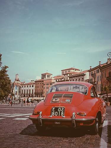 car red Volkswagen Beetle automobile