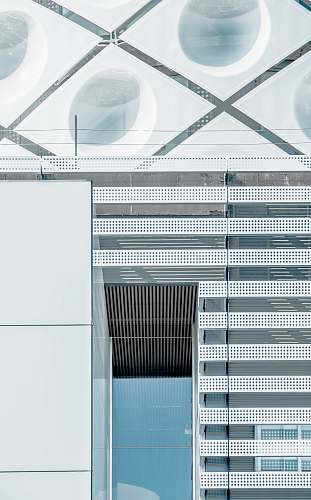 spain The exterior of an office building in Madrid with a glass door and geometric shapes on the facade architecture