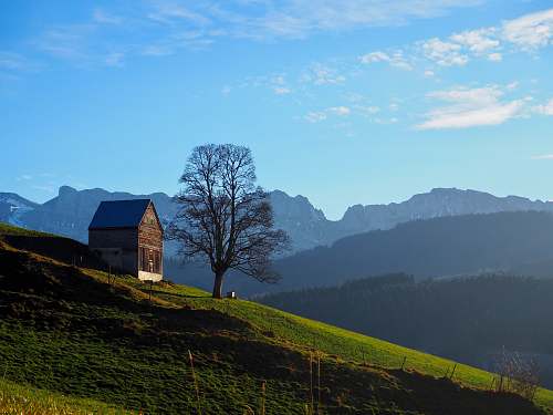 outdoors brown wooden house switzerland