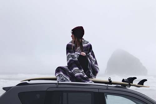 people woman sitting black car human