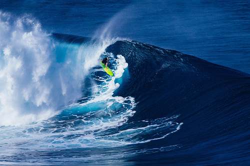 water person doing surfing on wave ocean