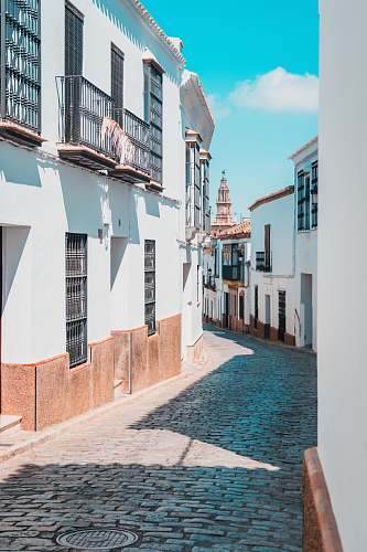 carmona empty street between houses cobblestone