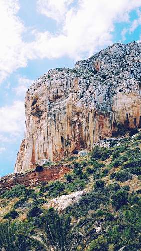 cliff landscape photography of mountain calp