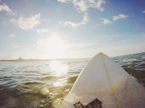 ocean person riding a surfboard surf