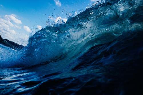 ocean beach waves at daytime blue