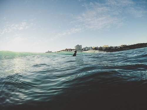australia man on body of water during daytime surf