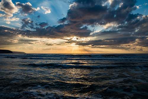 sea sea during sunset ocean