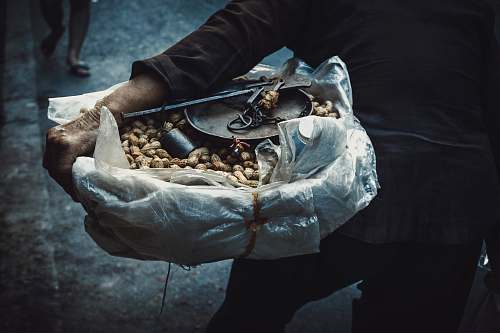 person person holding bunch of peanut people