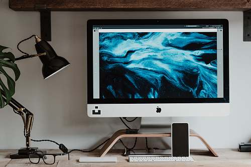 electronics silver imac on white table monitor
