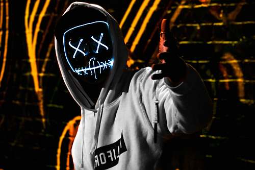 apparel man wearing white California pullover hoodie and LED mask clothing