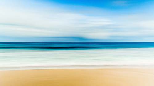 sea skyline photography of seashore water
