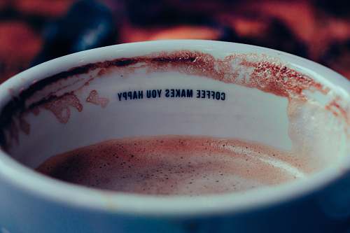 drink focus photo of white ceramic cup filled with coffee cup