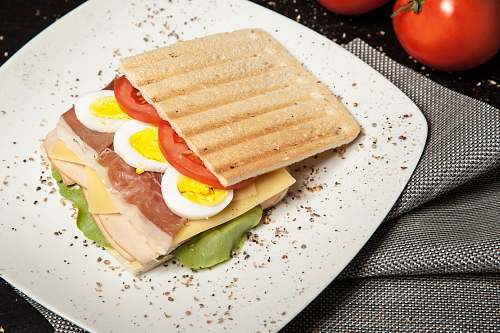 tomato sandwich on top white plate meal