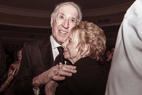 person man and woman in formal suit dancing suit