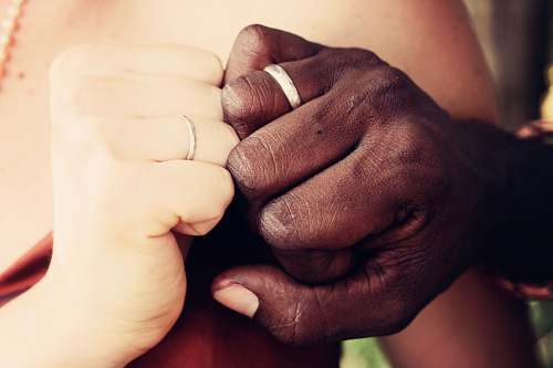 people two person showing silver-colored rings couple