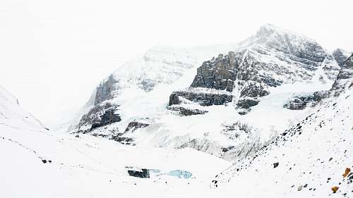outdoors land covered in snow mountain