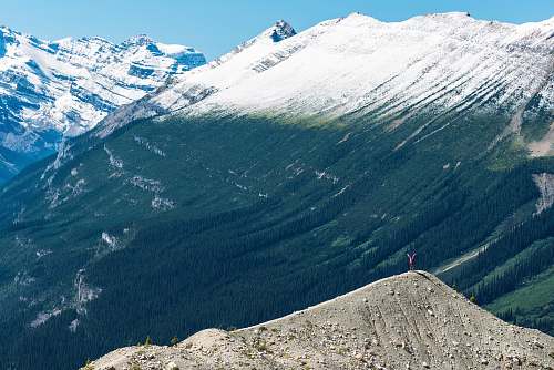 peak man standing on mountain canada