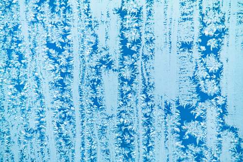 ice aerial photography of snow covered forest outdoors