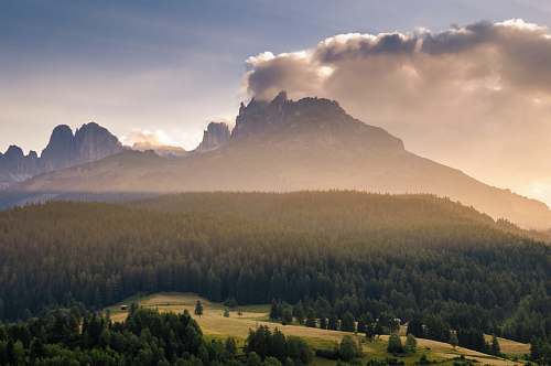 landscape mountain surrounded by trees trees