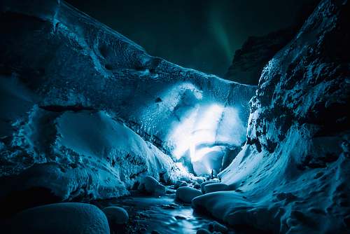 snow person on white cave ice