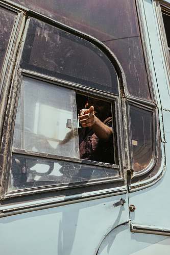 human man riding bus person