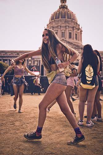 human woman wearing yellow fanny pack person