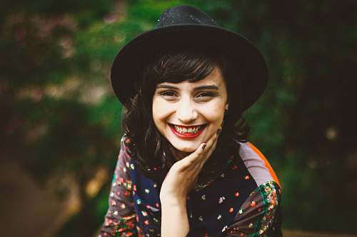 person woman with red lipstick smiling woman