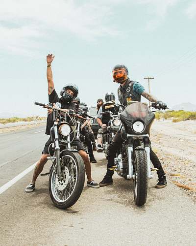 motorcycle people riding on black motorcycles transportation