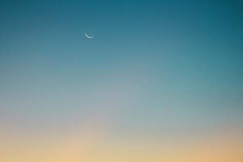 moon crescent moon on blue sky gradient