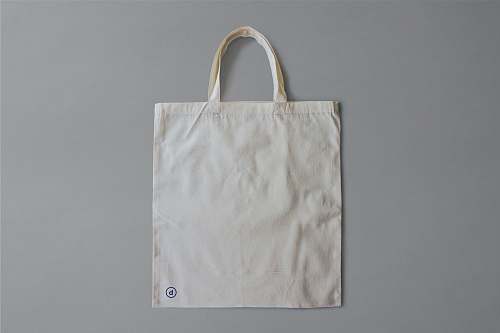 accessory white reusable bag on gray surface bag