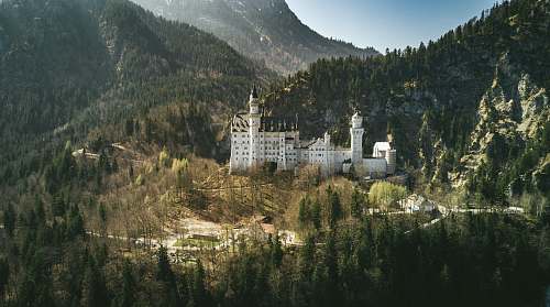 building landscape photo of castle near the mountain nature