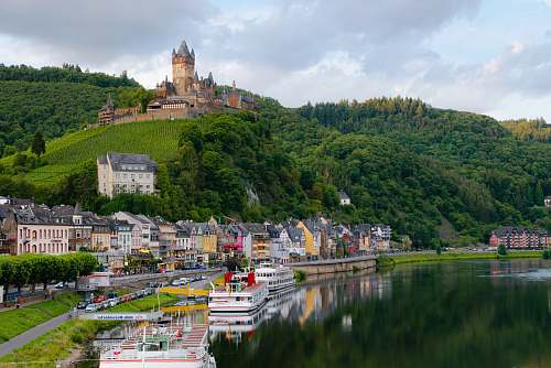 castle landscape photo of gray and brown buildings architecture