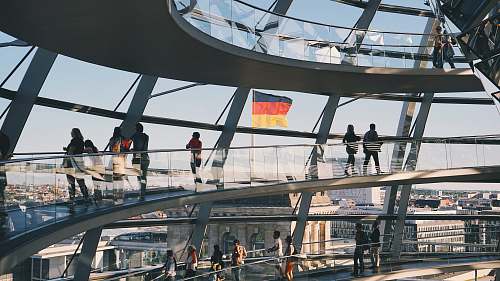 berlin people walking on gray corridors in building building