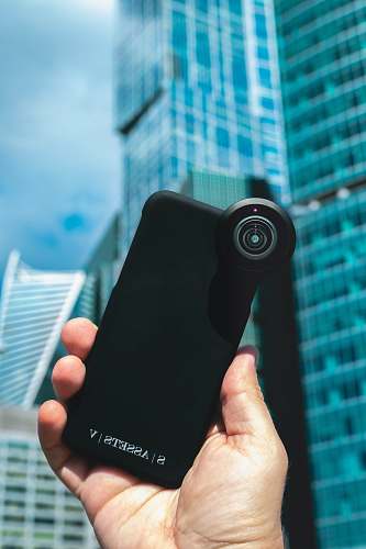 phone black canon camera lens in hand human