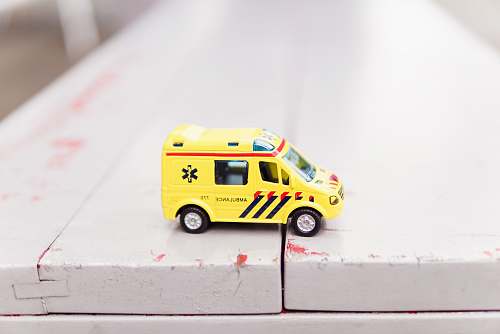 yellow ambulance toy