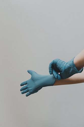 clothing person in blue gloves and blue denim jeans human