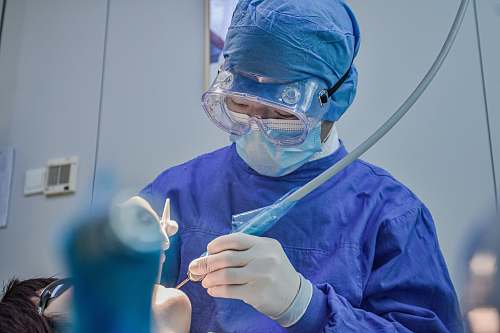 clothing person in blue long sleeve shirt wearing blue goggles helmet