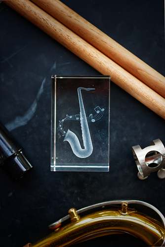 tool gray saxophone icon text