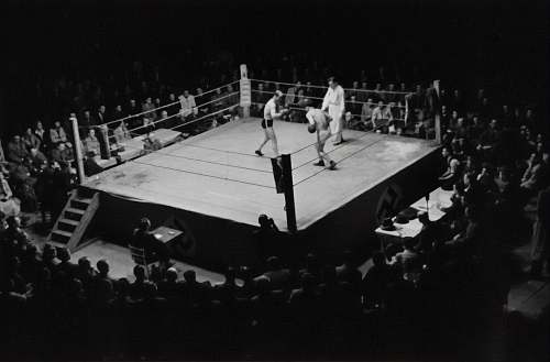 human grayscale photo of boxing game person