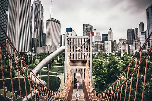 bridge two people jogging on bridge building