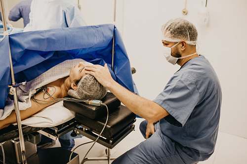 doctor man lying on the hospital bed human