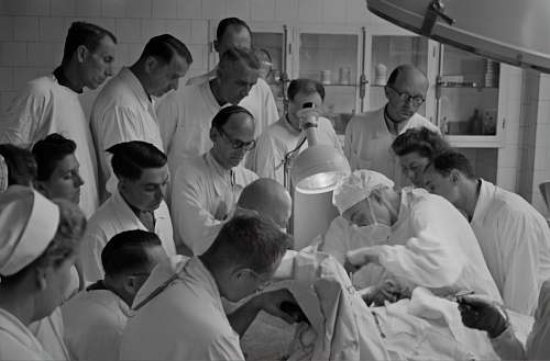 hospital photography of people watching watching operation inside room black-and-white