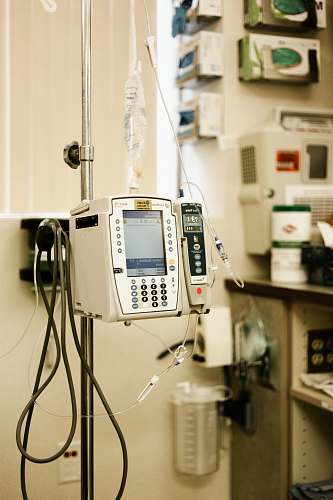 hospital white defibrillator with stand phone