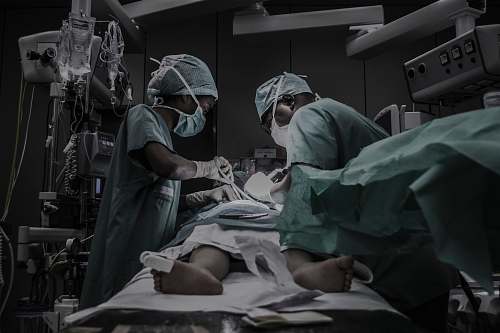 person doctors treating patient people
