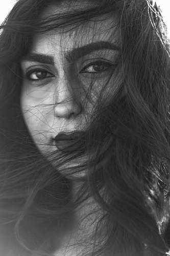 black-and-white grayscale photo of woman face