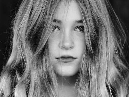 face grayscale photography of woman black-and-white